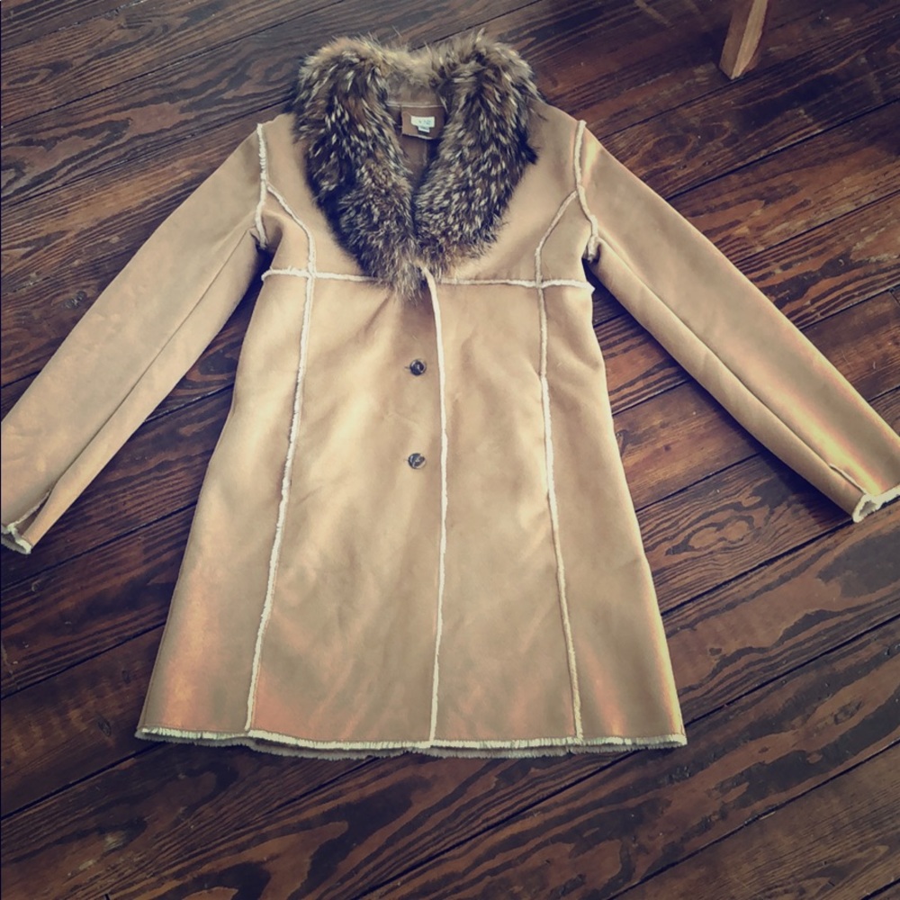Cache Faux suede with raccoon fur trim.